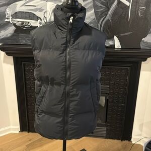 Men’s size extra small puffer vest.